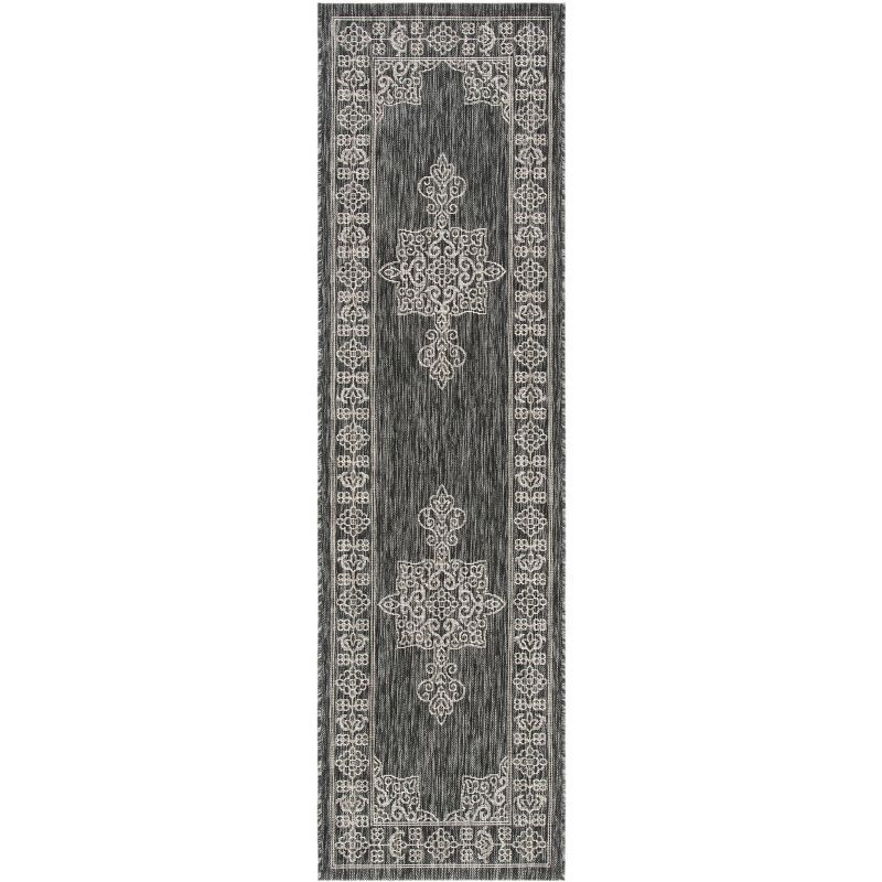 Black and Ivory Synthetic Indoor/Outdoor Runner Rug