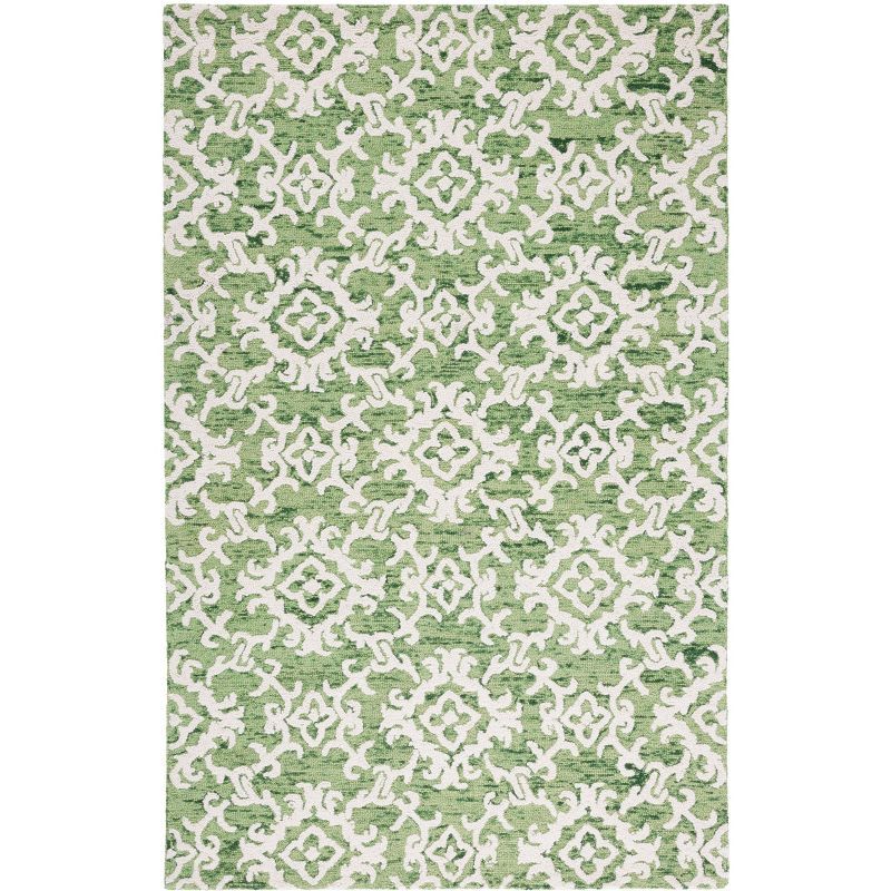 Ivory and Green Tufted Wool 4' x 6' Area Rug