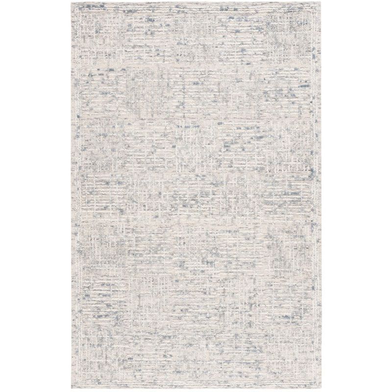 Handmade Light Blue and Ivory Abstract Wool Tufted Rug