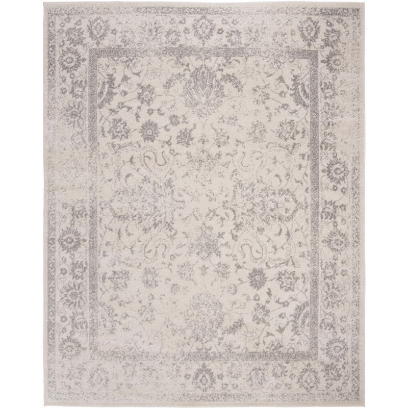 Ivory and Silver Rectangular 6' x 9' Synthetic Area Rug