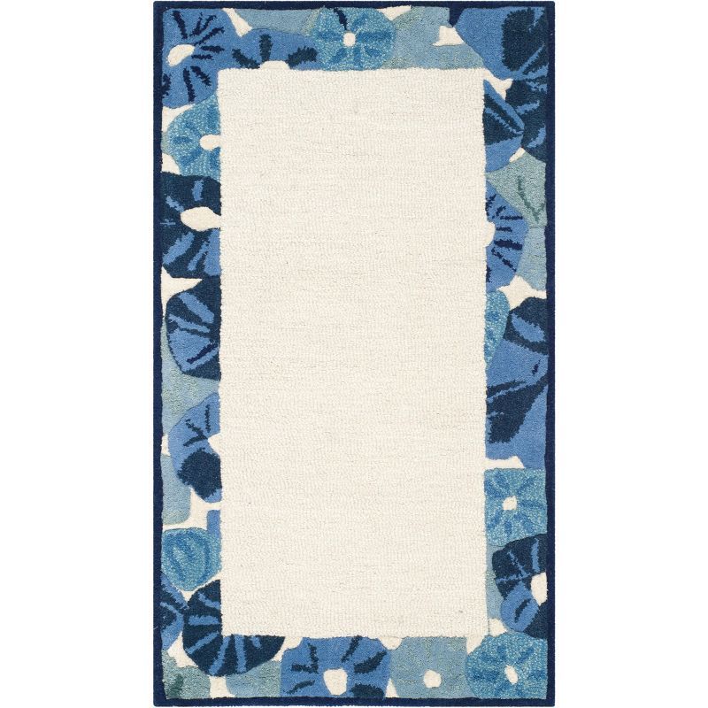 Azurite Blue Floral Border Hand-Tufted Wool Rug