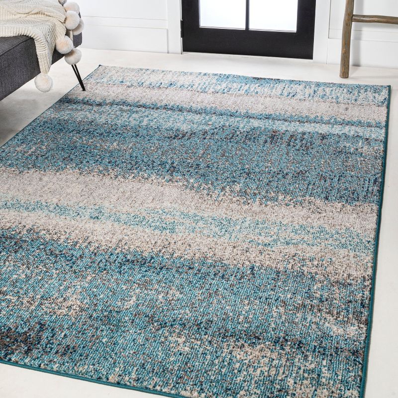 Cream and Turquoise Abstract Synthetic Area Rug