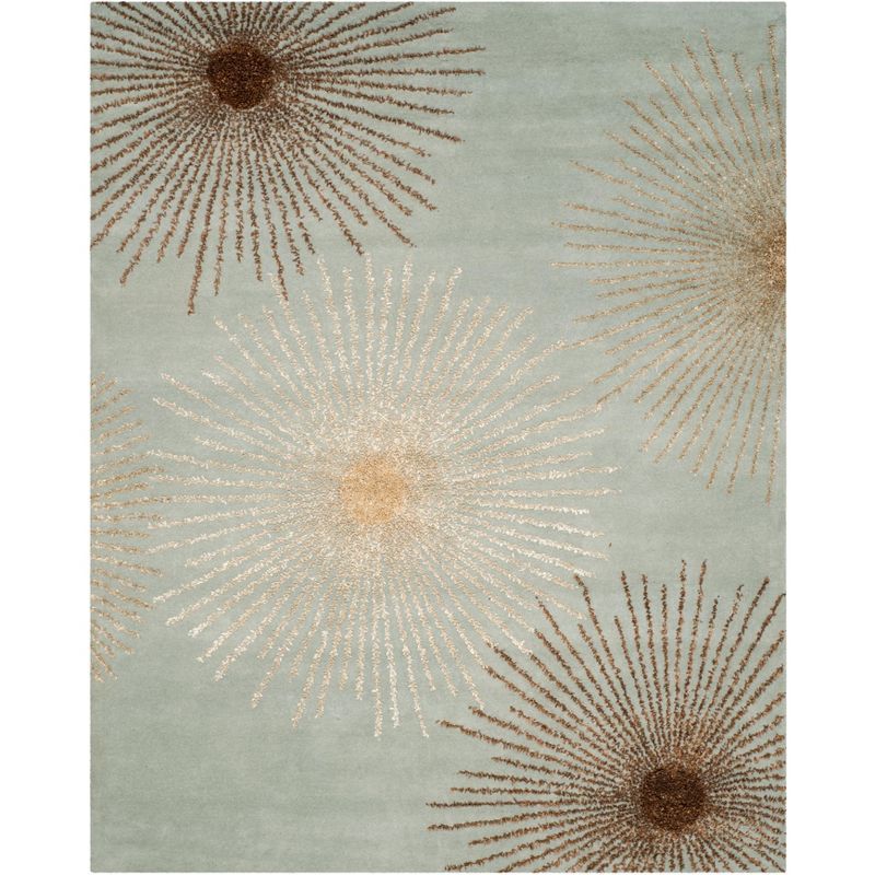 Light Blue and Multi 6' x 9' Wool Tufted Area Rug