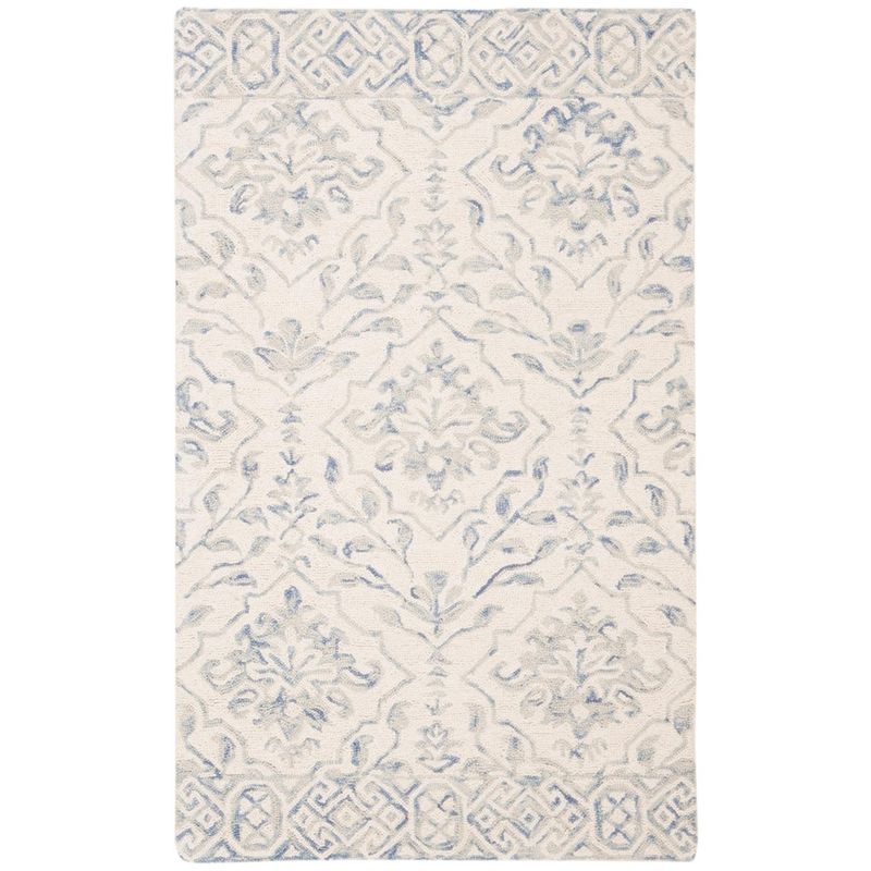 Handmade Light Blue and Ivory Wool Tufted Area Rug