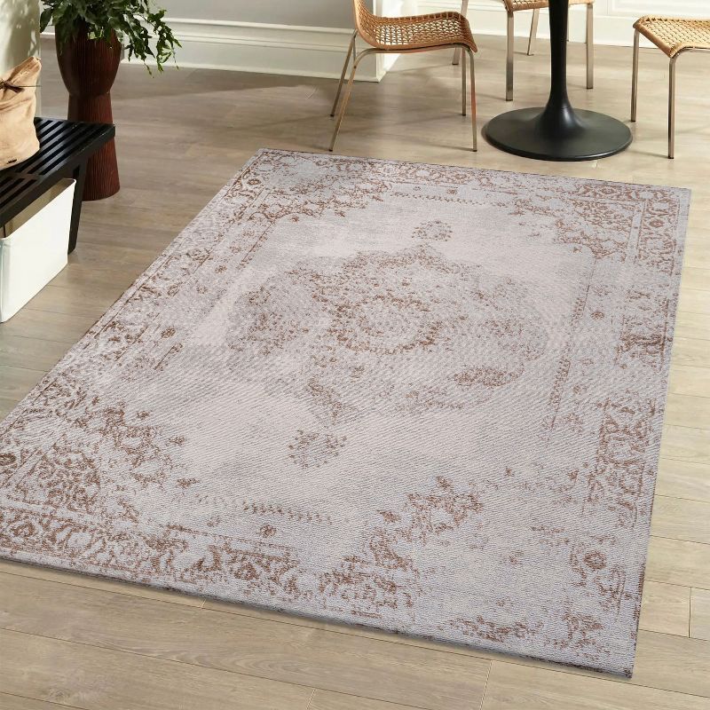 Ivory and Brown Synthetic Reversible 8' x 10' Area Rug