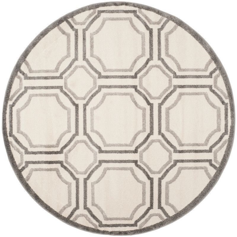 Ivory and Light Grey Round Synthetic Area Rug