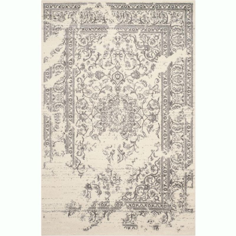 Ivory and Silver Rectangular 6' x 9' Synthetic Area Rug