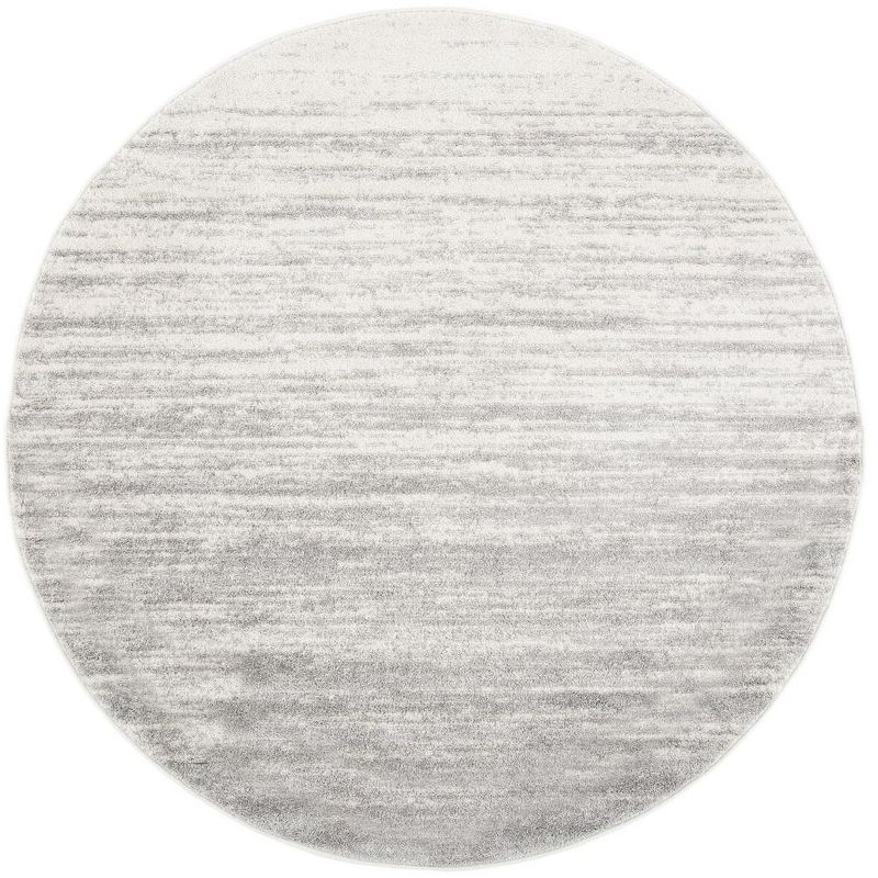 Ivory and Silver Synthetic 4' Round Easy-Care Area Rug