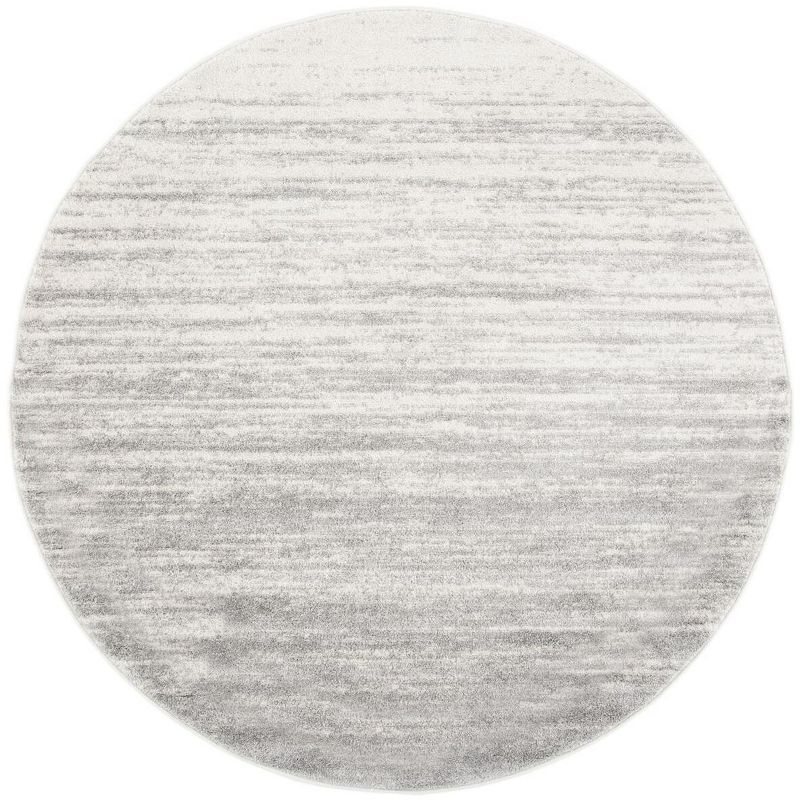 Ivory and Silver Synthetic 4' Round Easy-Care Area Rug