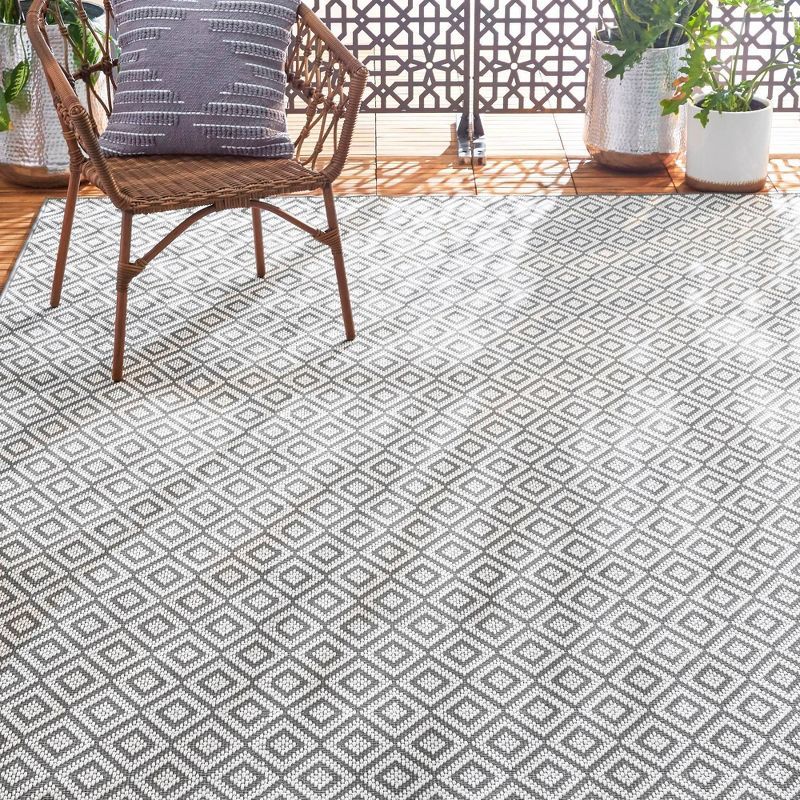 Gray and Cream 5'3" x 7'3" Synthetic Diamond Pattern Indoor/Outdoor Rug
