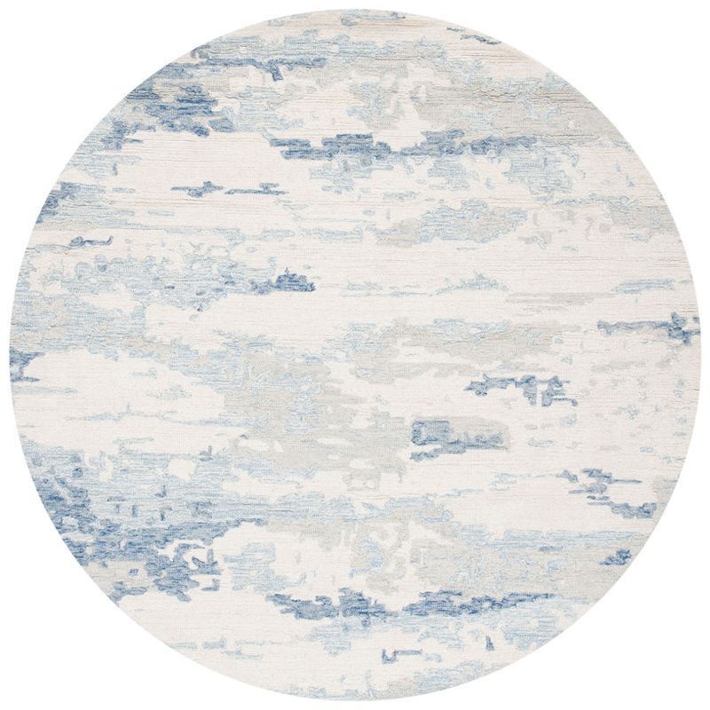 Ivory and Blue Round Handmade Wool Abstract Area Rug