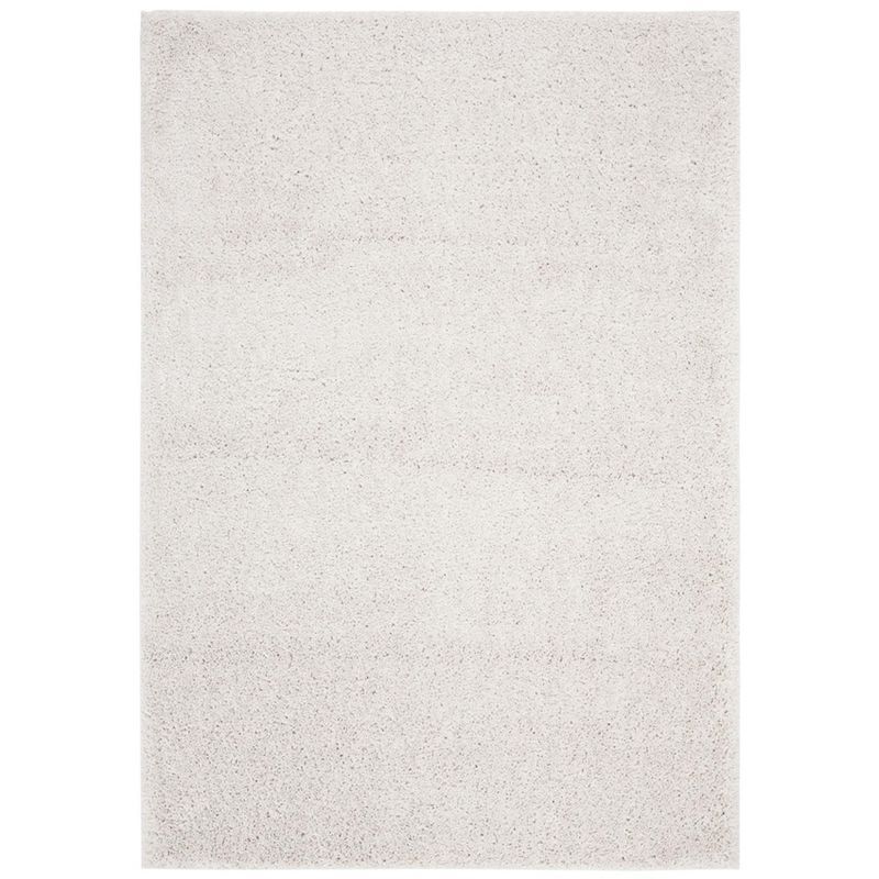 Beige 9' x 12' Solid Shag Synthetic Area Rug