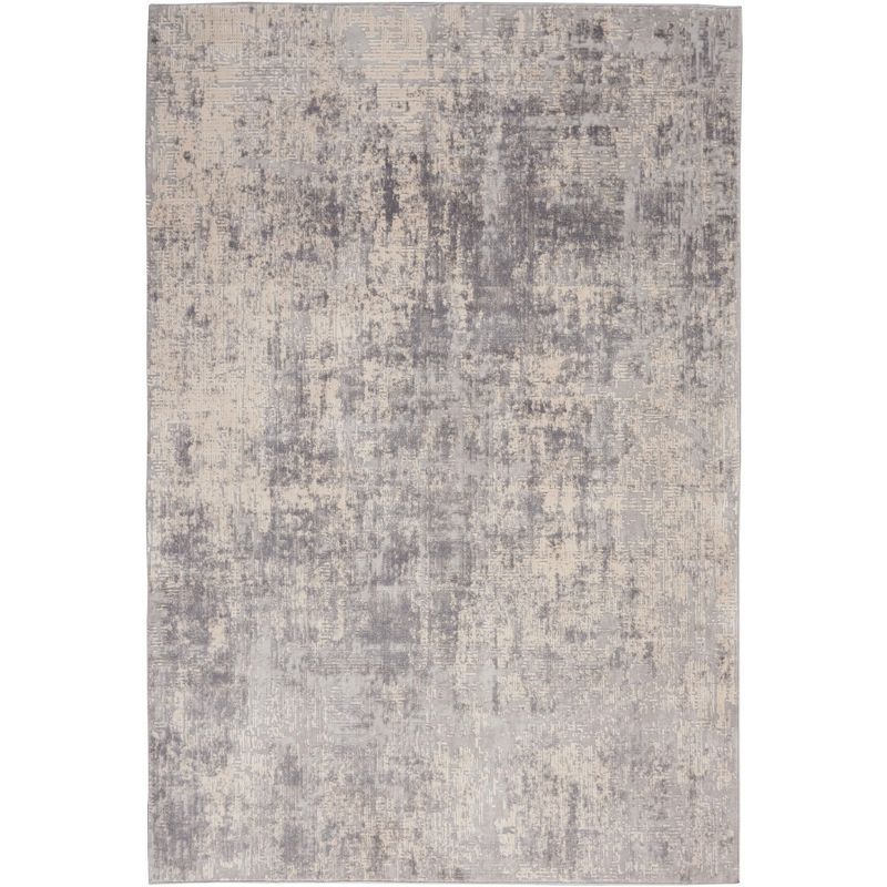 Ivory Abstract Power-Loomed Synthetic 5'3" x 7'3" Area Rug