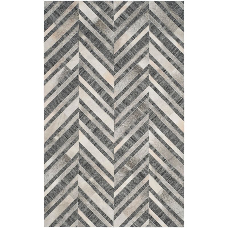 Ivory and Dark Grey Handmade Geometric Cowhide Area Rug