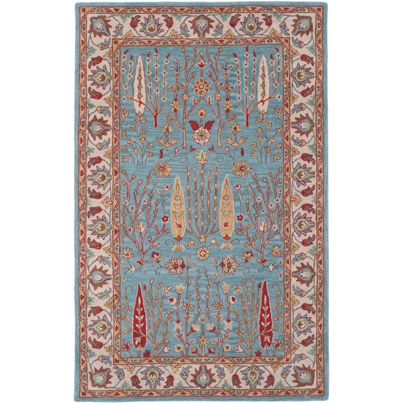 Handmade Blue and Ivory Wool 4' x 6' Area Rug