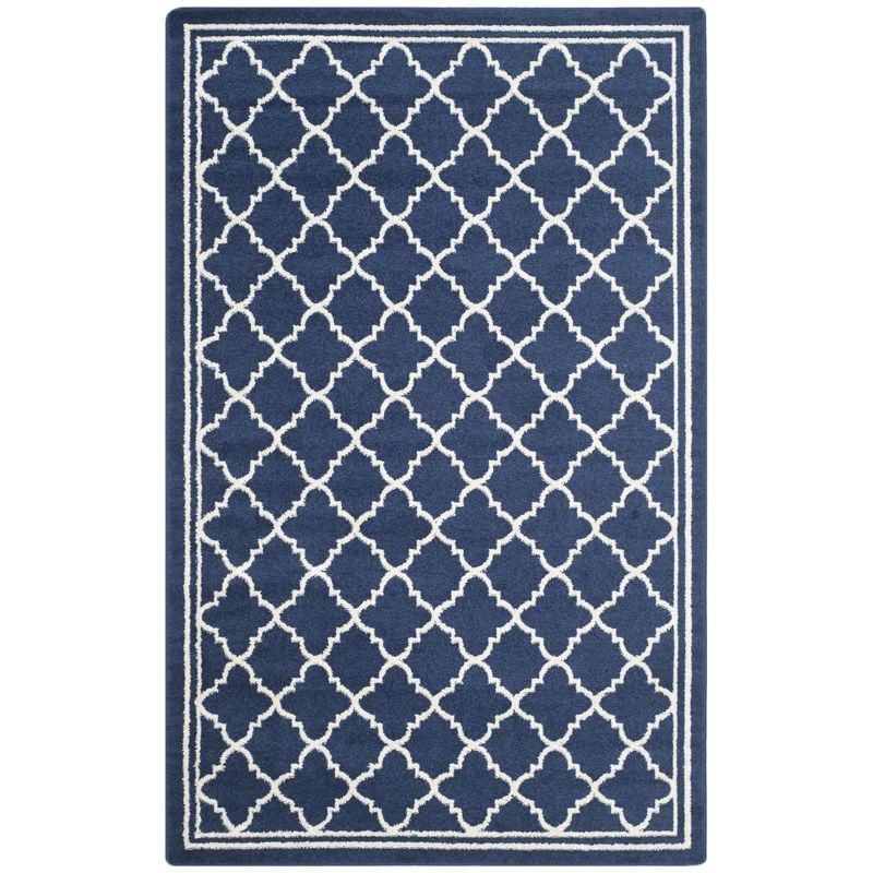 Navy and Beige Geometric 4' x 6' Synthetic Area Rug