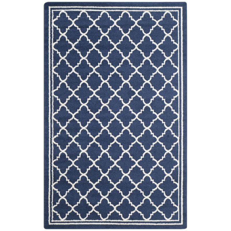 Navy and Beige Geometric 4' x 6' Synthetic Area Rug