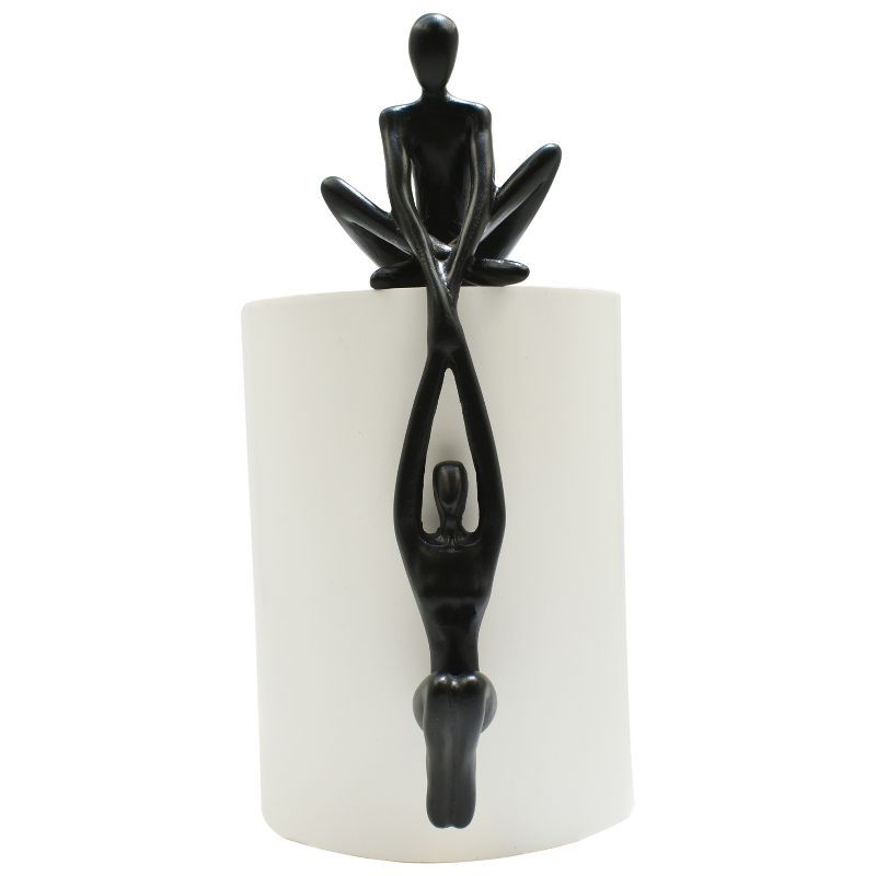 Black Resin Man Lifting Woman Onto Ledge Sculpture