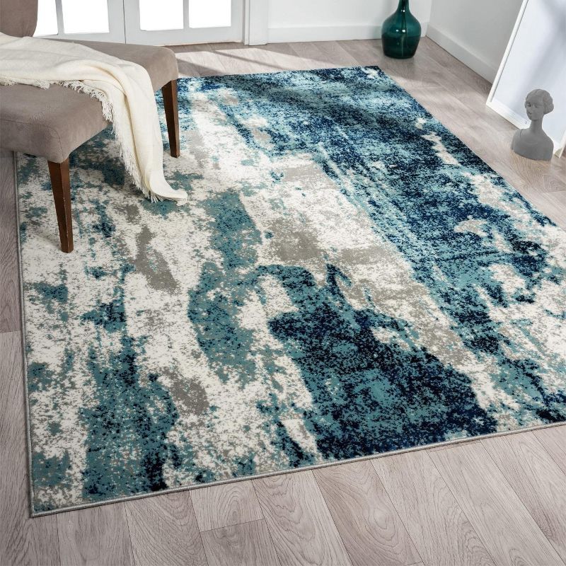 Light Blue Abstract 5' x 7' Stain-Resistant Area Rug