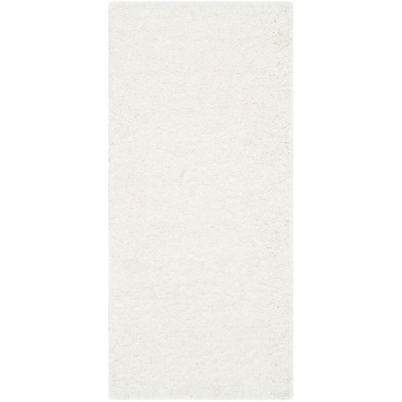 Handmade White Tufted Shag Synthetic Area Rug