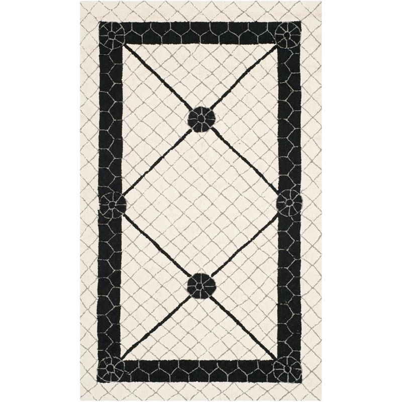 Ivory and Black Hand-Hooked Geometric Cotton Area Rug