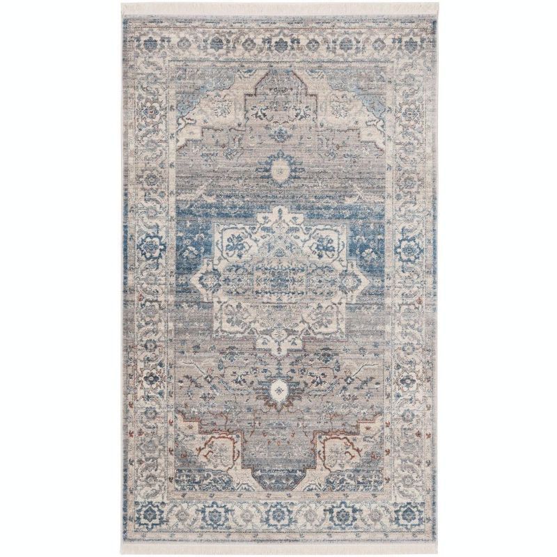 Vintage Blue and Gray Rectangular 6' x 9' Synthetic Area Rug