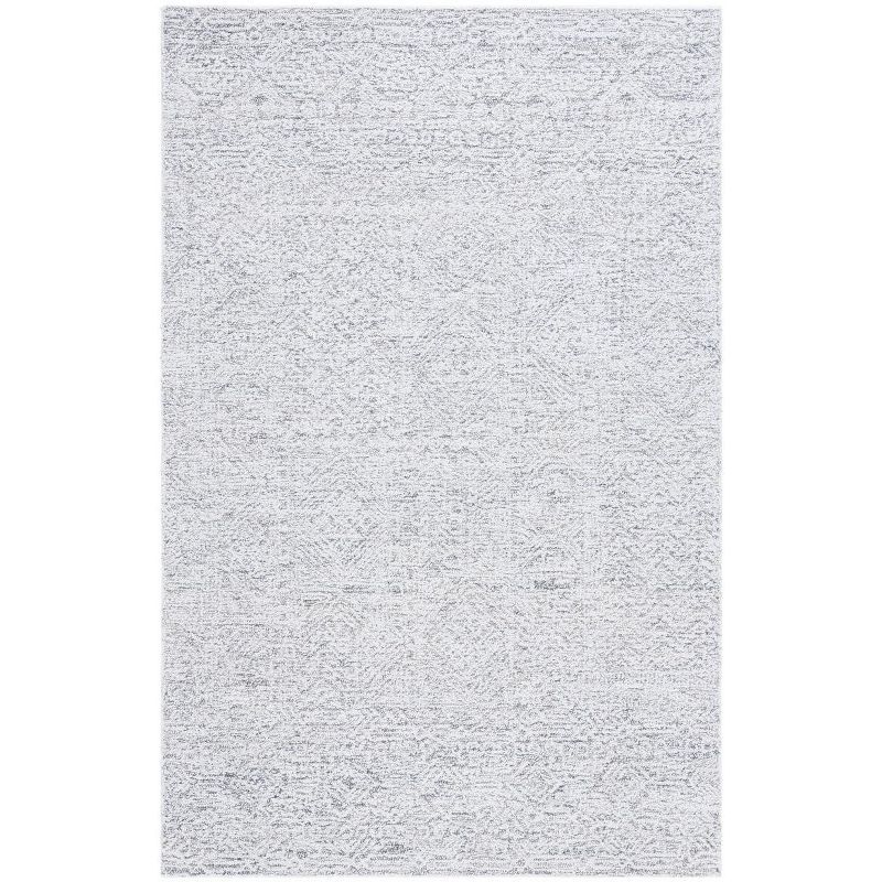 Ivory Hand Tufted Wool and Synthetic Area Rug