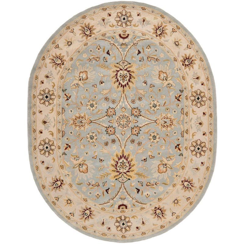 Handmade Light Blue and Ivory Wool Oval Area Rug