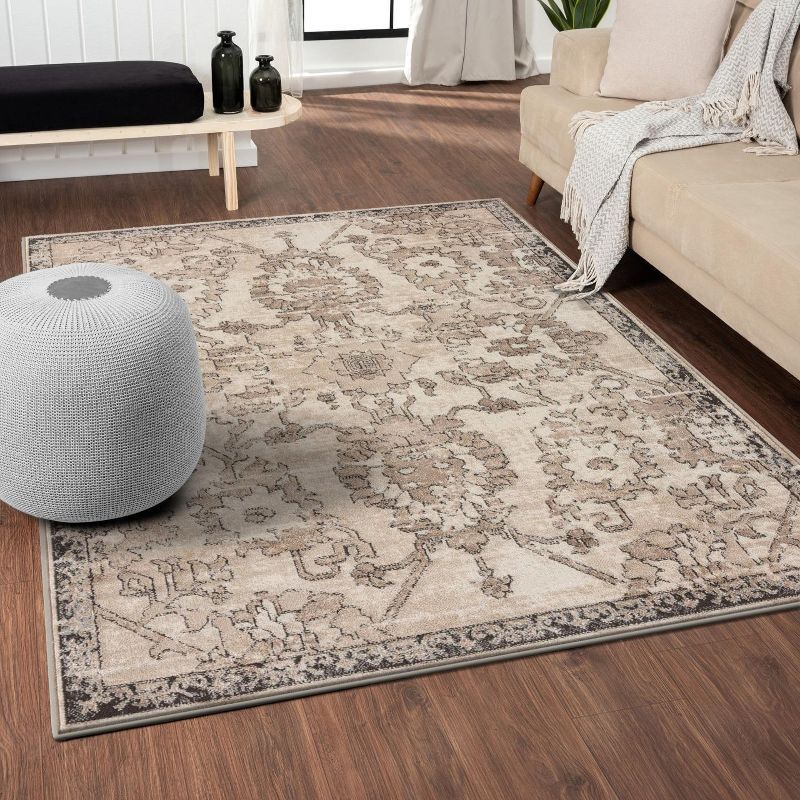 Beige Floral Distressed 8' x 10' Synthetic Area Rug