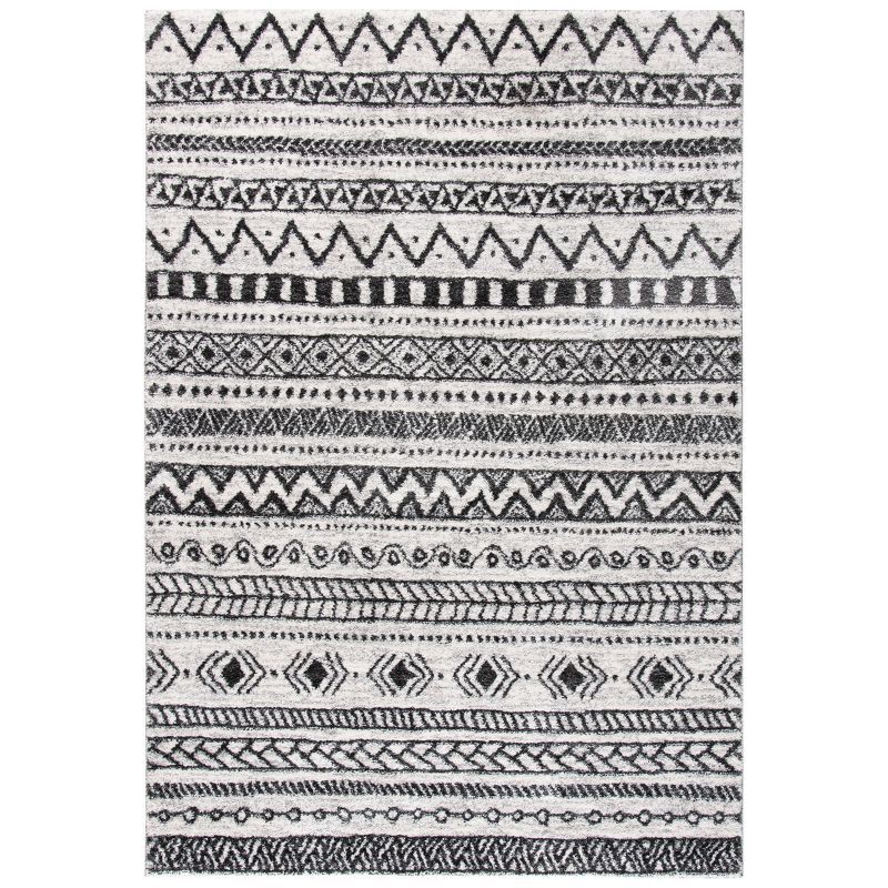 8' x 10' Black and Ivory Geometric Synthetic Area Rug