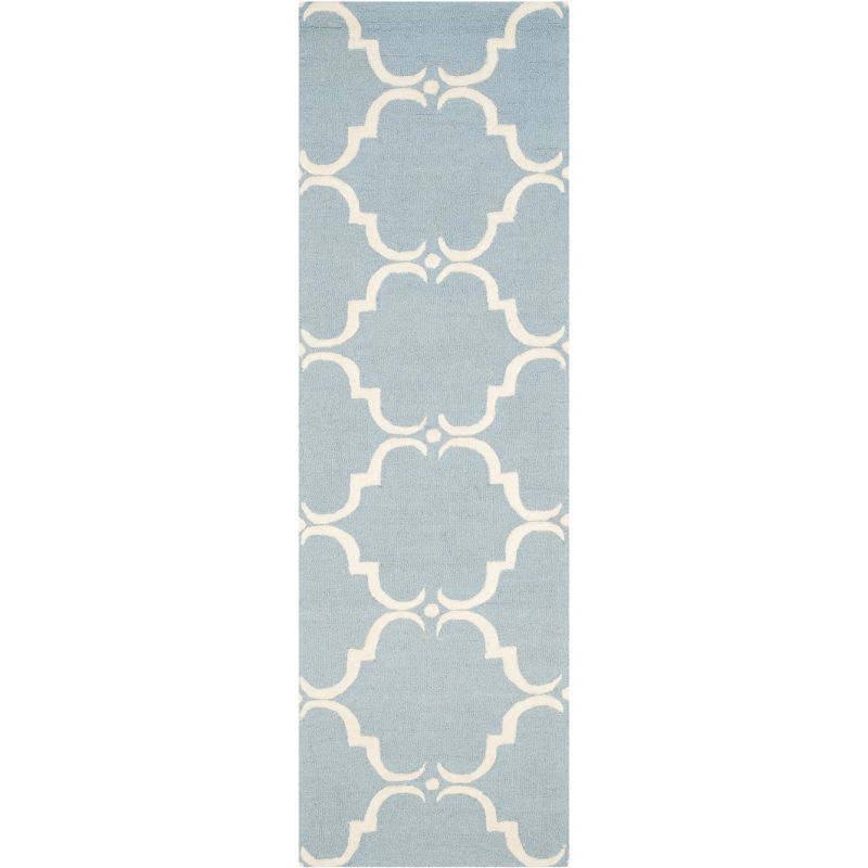 Handmade Blue and Ivory Wool Tufted Area Rug