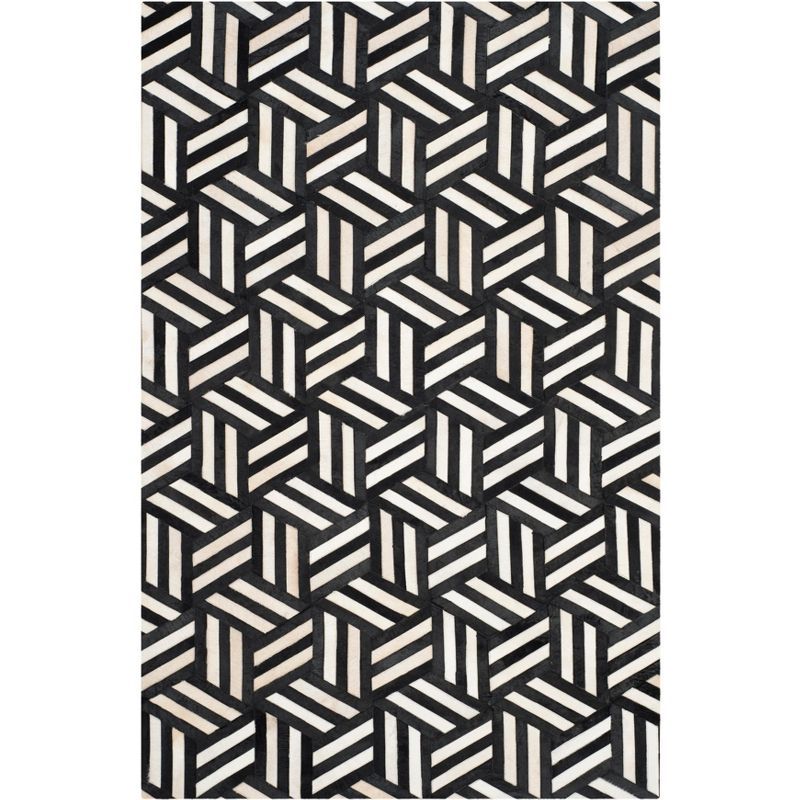 Handmade Black and Ivory Geometric Cowhide Area Rug