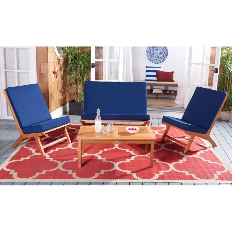 Chaston Natural Wood 4-Piece Patio Set with Navy Cushions