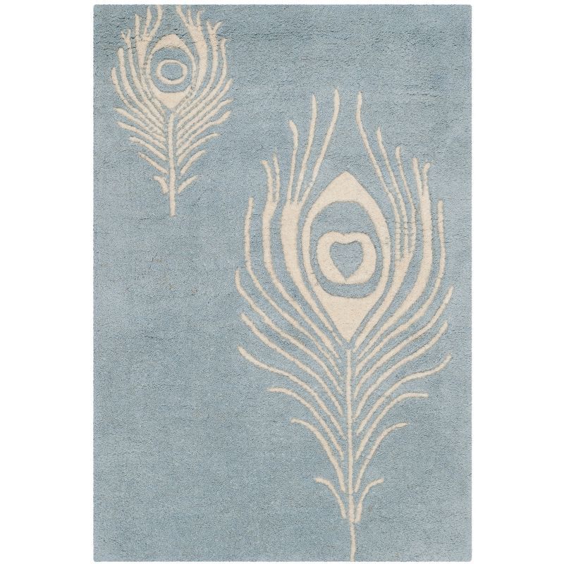 Handmade Light Blue and Ivory Wool Area Rug