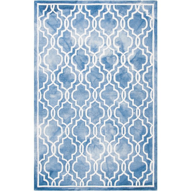 Blue and Ivory Tufted Wool 4' x 6' Area Rug