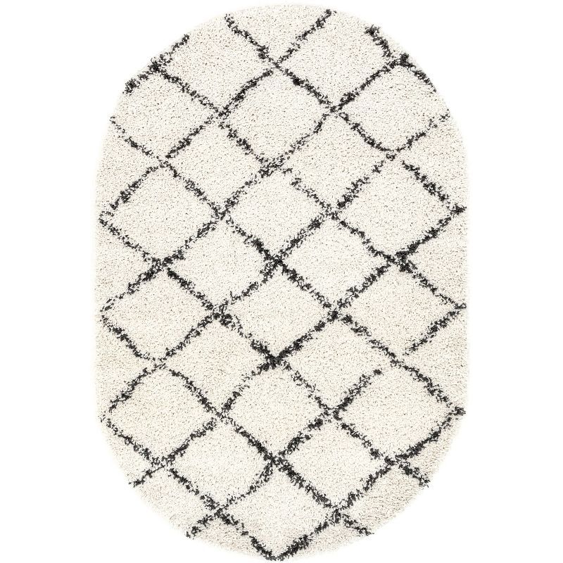 Off-White 6' 7" x 9' Oval Synthetic Shag Area Rug with Tassels