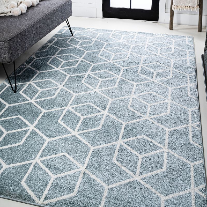 Light Blue and White Geometric 4' x 6' Area Rug