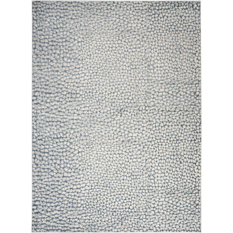 Ivory and Blue Abstract Synthetic 8' x 10' Area Rug