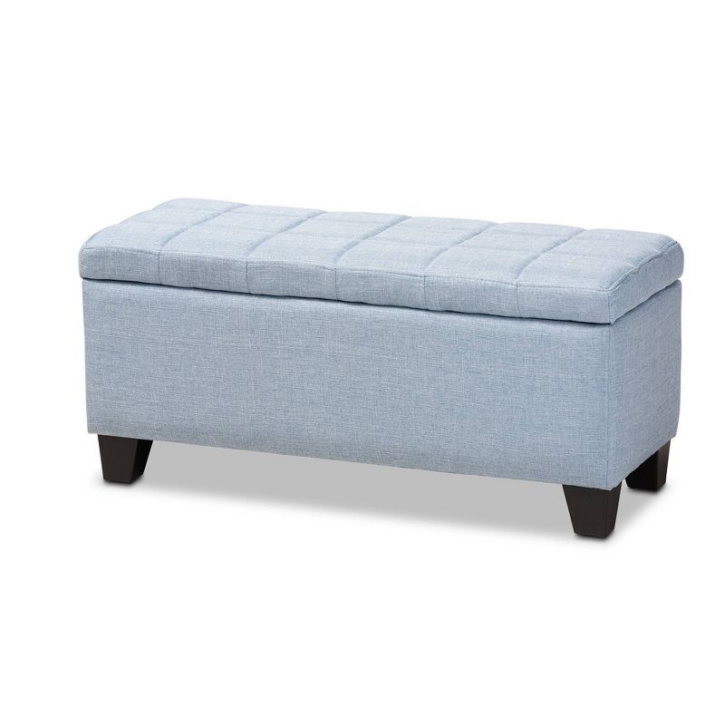 Light Blue Tufted Fabric Storage Ottoman with Black Wood Feet