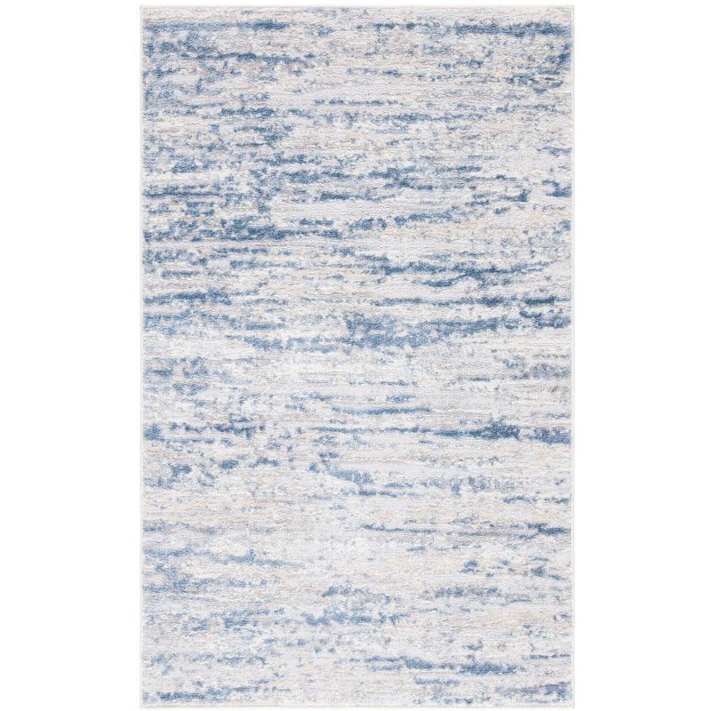 Ivory and Blue Abstract Synthetic 4' x 6' Easy-Care Area Rug