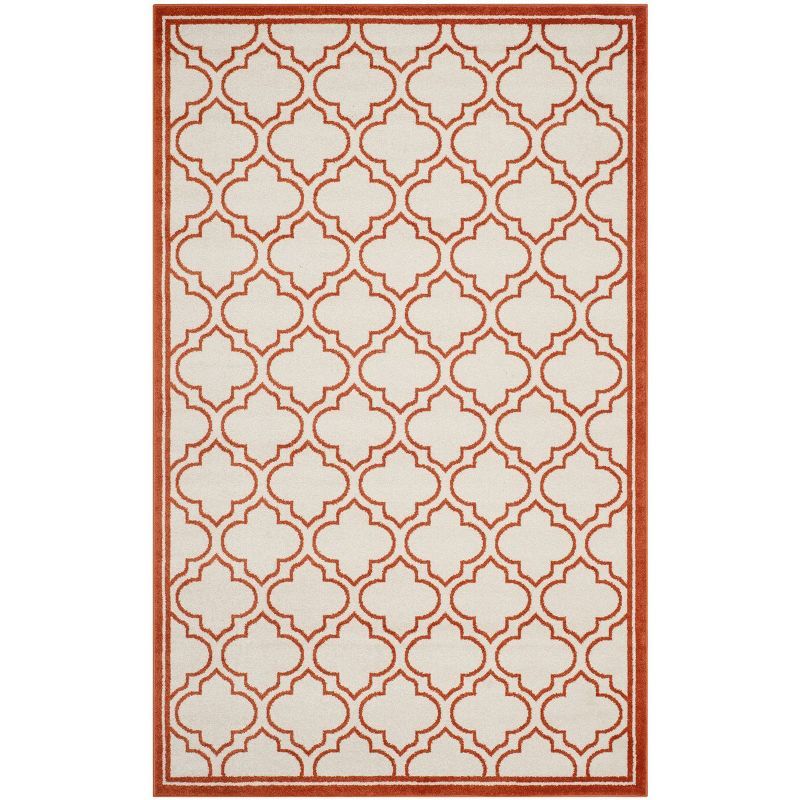 Ivory and Orange Geometric Low Pile Area Rug