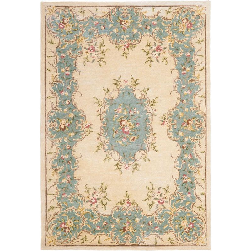 Ivory and Light Blue 6' x 9' Hand-Tufted Wool Area Rug