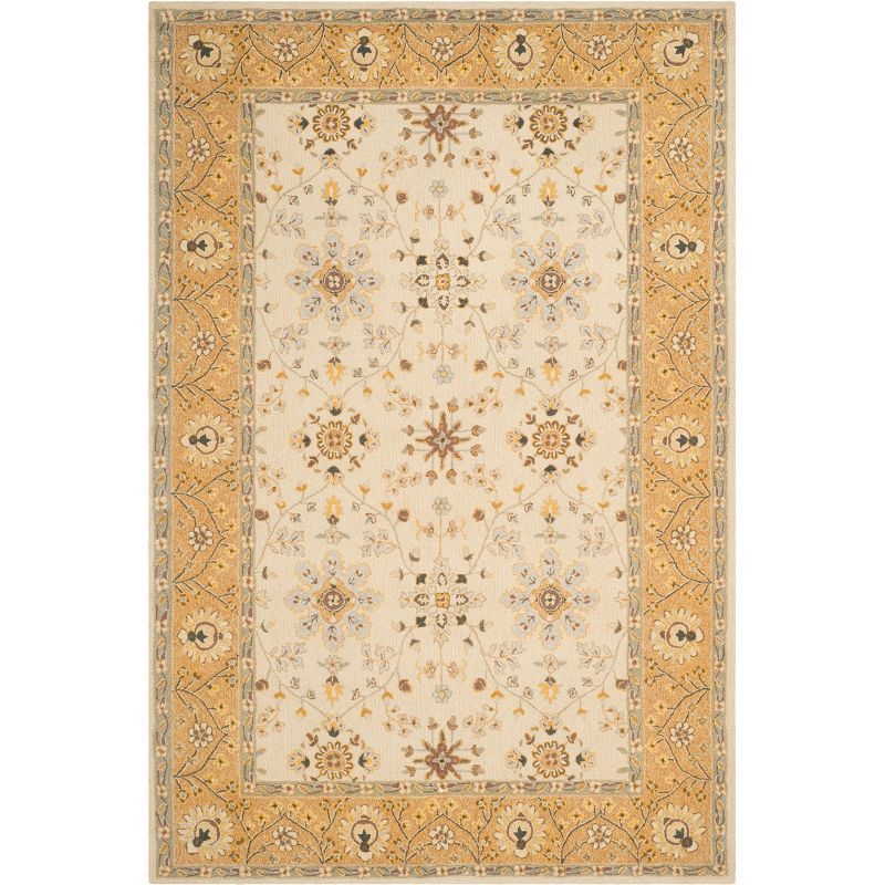 Ivory and Beige Rectangular Synthetic 6' x 9' Area Rug