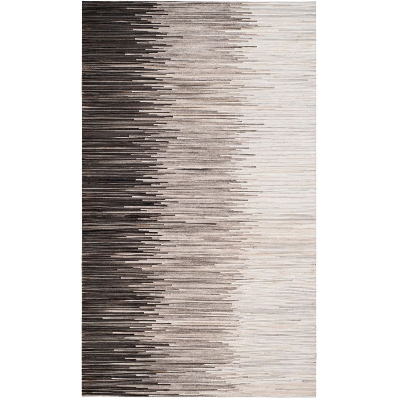 Handmade Ivory and Charcoal Geometric Cowhide Area Rug