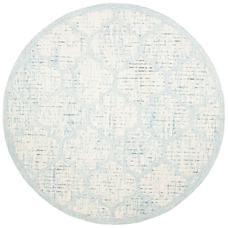 Ivory and Turquoise Round Tufted Wool Area Rug