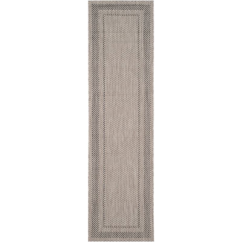 Beige and Black Synthetic 27'' Indoor/Outdoor Runner Rug