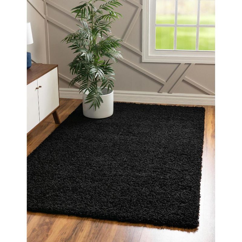 Jet Black 8' x 10' Solid Shag Synthetic Area Rug