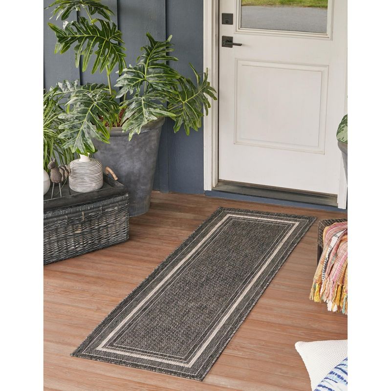 Black and Beige Flat Woven Synthetic Outdoor Runner Rug