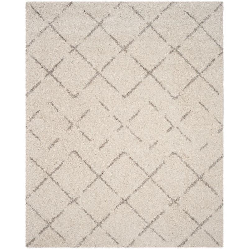 Ivory and Beige Geometric Shag 8' x 10' Area Rug