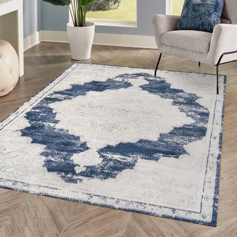 Ivory and Navy Synthetic Flat Woven 8' x 10' Area Rug